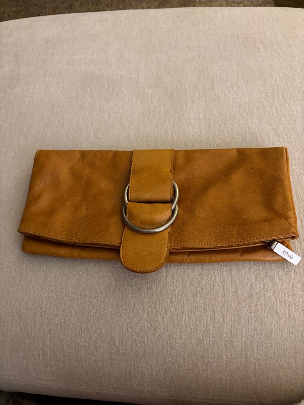 HOBO Fold-Over Clutch Wristlet in Cognac Brown with Double Ring Detail